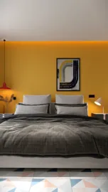 bedroom interior featuring a modern bed design with decorative pillows, styled in a contemporary aesthetic with a bold yellow accent wall, emphasizing space utilization using Homestyler's real-time 3D rendering feature.
