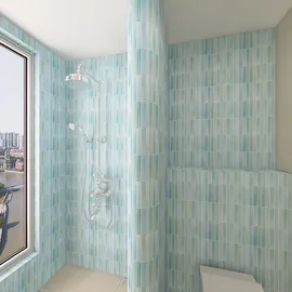Modern bathroom with a shower area featuring blue patterned tiles, showcasing a contemporary design style and enhancing the space's functionality using Homestyler's real-time 3D rendering.