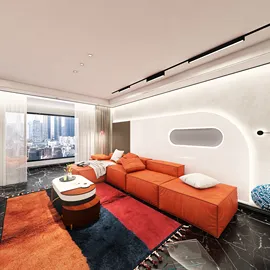 Modern living room featuring a spacious orange modular sofa, designed for an open layout, showcasing contemporary interior decor with smart furniture arrangement capabilities.